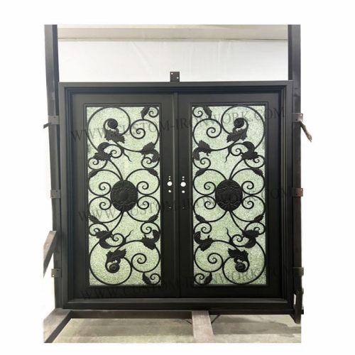 Hand-hammered iron door decorated entrance of house