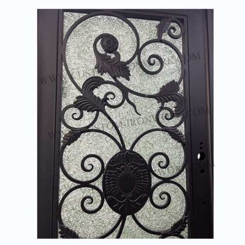 Hand-hammered iron door decorated entrance of house