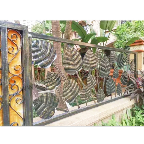 Hand forged iron decorated custom fence for residential district